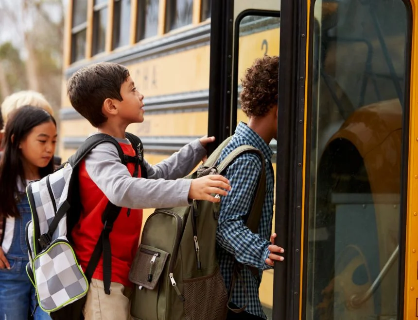 Elementary School Kids Climbing On To A School Psue5gt.webp